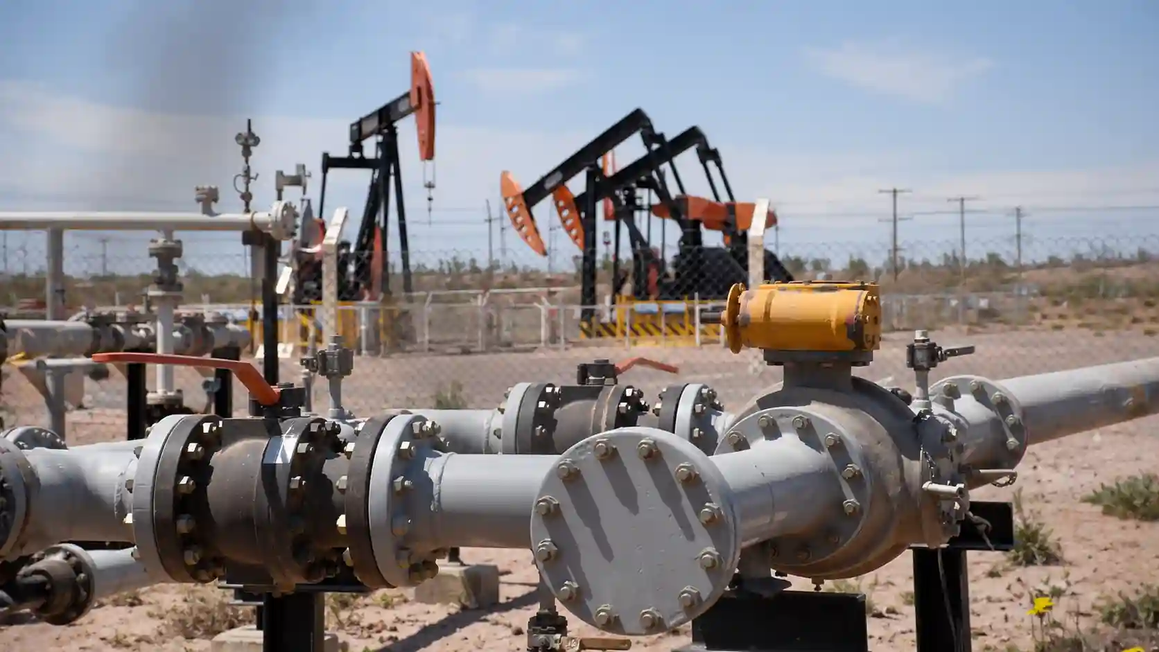 Drilling rigs in the Vaca Muerta shale formation near Añelo, Neuquén province, Argentina